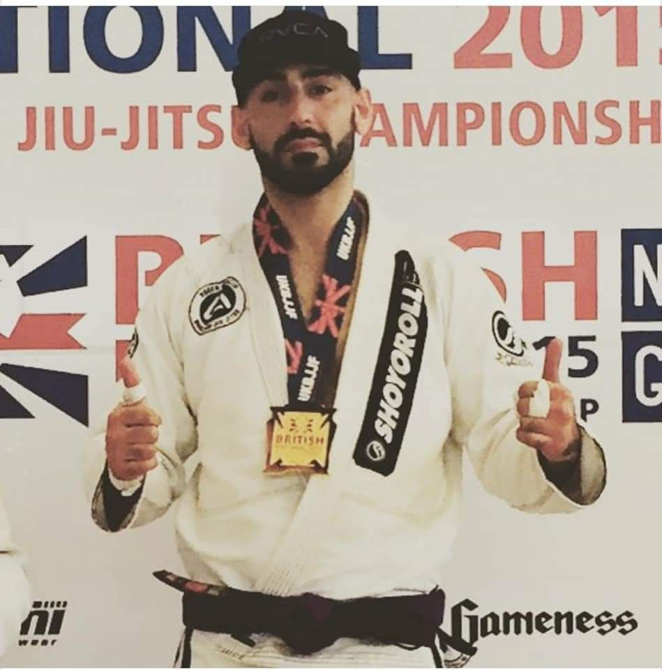 John Ioannou with British National Championship gold medal
